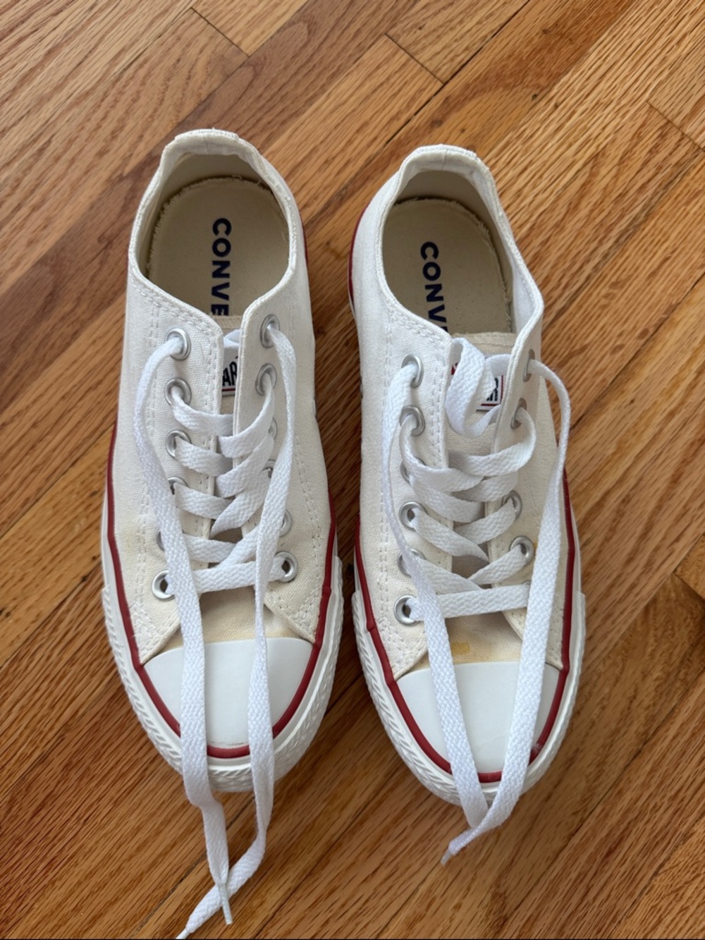 Converse Low-Top Canvas Sneakers in White with Red Trim